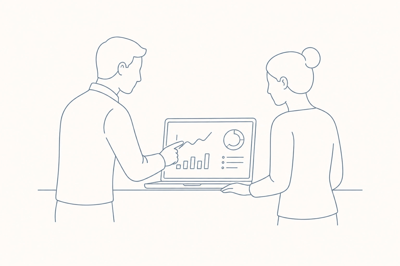 Two professionals standing at a laptop discussing project metrics and dashboard KPIs